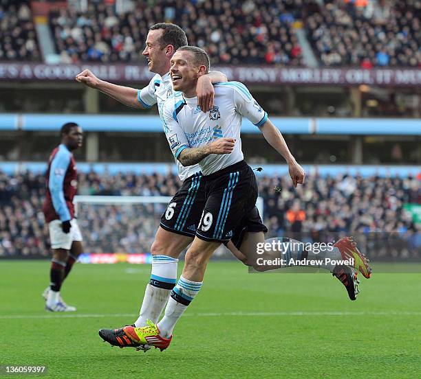 Craig Bellamy of Liverpool celebrates after scoring the opening goal during the Barclays Premier League match between Aston Villa FC and Liverpool FC...