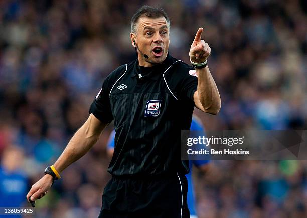 Referee Mark Halsey in action during the npower Championship match between Portsmouth and Southampton at Fratton Park on December 18, 2011 in...