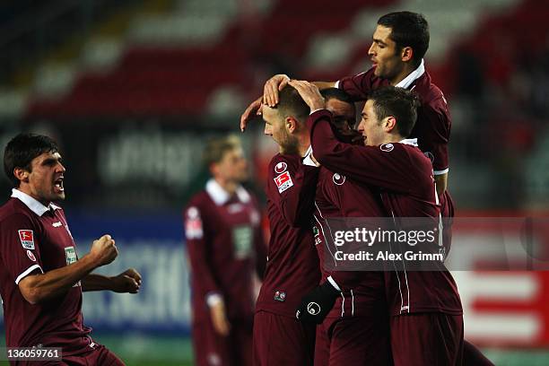 Adam Nemec of Kaiserslautern celebrates his team's first goal with team mates during the Bundesliga match between 1. FC Kaiserslautern and Hannover...