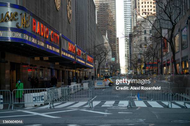 Street next to Radio City Music Hall sits empty due to rising cases of COVID-19 on December 23, 2021 in New York City. Radio City Music Hall...