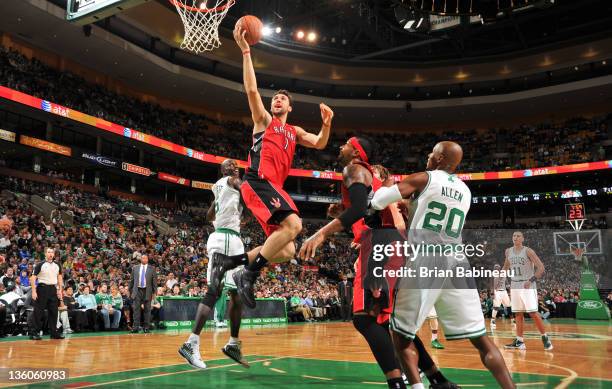 Andrea Bargnani of the Toronto Raptors shoots the ball against the Boston Celtics during the preseason game on December 21, 2011 at the TD Garden in...