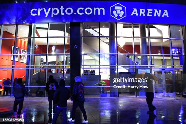 Crypto.com arena signs hang as fans wait to enter before the game between the San Antonio Spurs and the Los Angeles Lakers at Staples Center on...