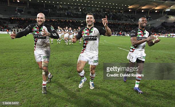 George Robson; Nick Easter and Ugo Monye of Harlequins celebrate after their victory during the Heineken Cup match between Toulouse and Harlequins at...
