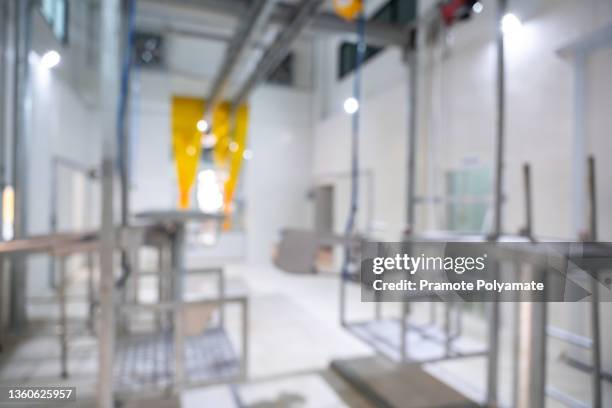 blurred background of slaughterhouse, meat industry - abattoir stock pictures, royalty-free photos & images