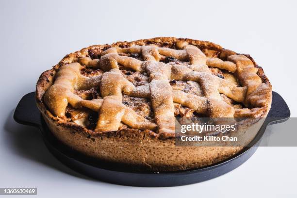 high angle view of fresh baked apple pie on a baking pan - american pie stockfoto's en -beelden