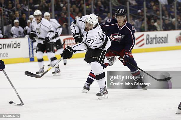 Alec Martinez of the Los Angeles Kings takes a shot on goal during the game against the Columbus Blue Jackets at Nationwide Arena on December 15,...