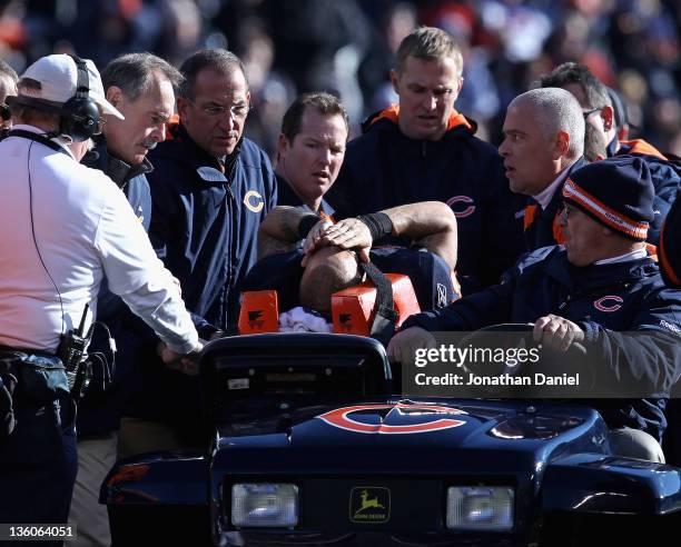 Johnny Knox of the Chicago Bears is carted off the field after suffering an injury against the Seattle Seahawks at Soldier Field on December18, 2011...