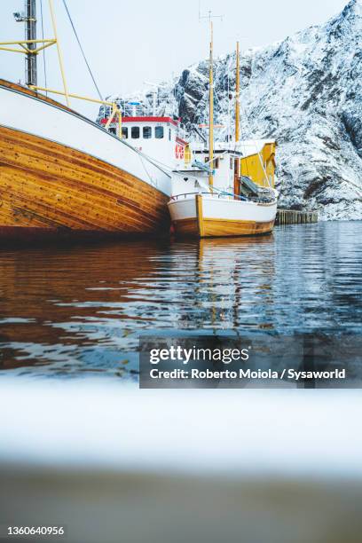 fishing boats in the icy sea in winter, norway - lofoten och vesterålen bildbanksfoton och bilder