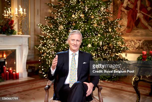 In this image released on December 24, King Philippe of Belgium delivers his Christmas Speech in his office at the Royal Laeken Castle on December...