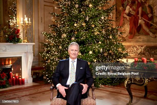 In this image released on December 24, King Philippe of Belgium delivers his Christmas Speech in his office at the Royal Laeken Castle on December...