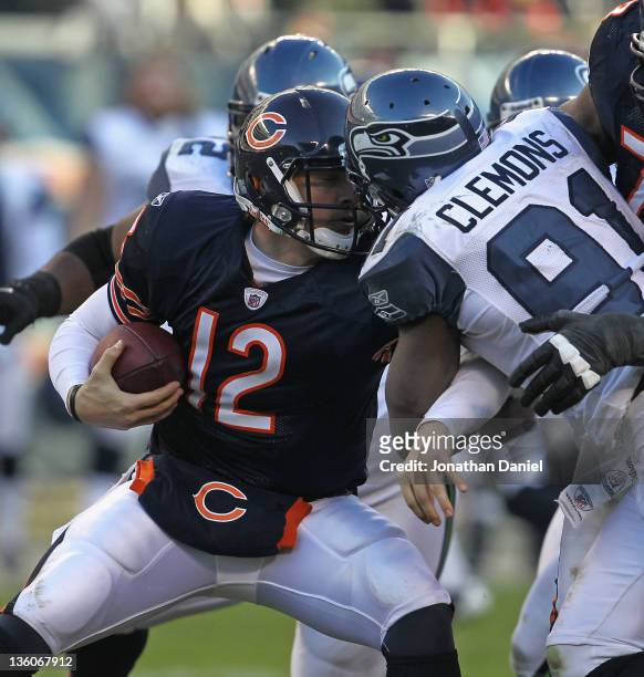 Chris Clemons of the Seattle Seahawks sacks Caleb Hanie of the Chicago Bears at Soldier Field on December18, 2011 in Chicago, Illinois. The Seahawks...