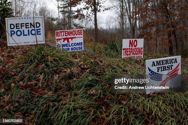 Signs on a front lawn express conservative political opinions on December 18 in rural Amherst County, Virginia.