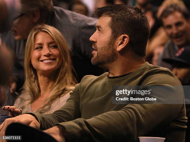 Boston Red Sox catcher Jason Varitek and his wife, Catherine were court side for tonight's preseason matchup against the Toronto Raptors.