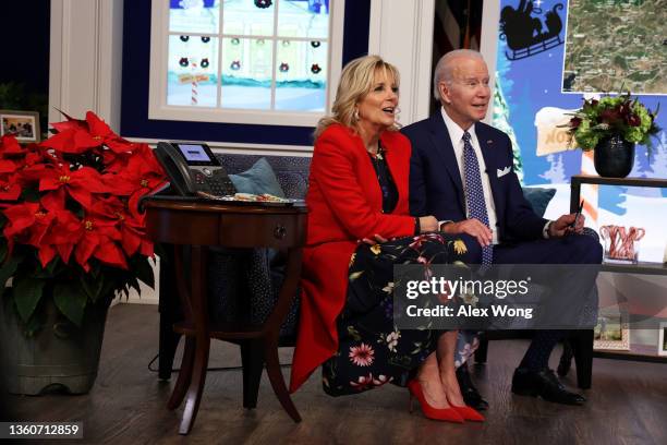 President Joe Biden and first lady Dr. Jill Biden participate in an event to call NORAD and track the path of Santa Claus on Christmas Eve in the...