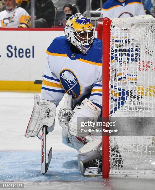 Malcolm Subban of the Buffalo Sabres defends the net against the Pittsburgh Penguins at PPG PAINTS Arena on December 17, 2021 in Pittsburgh,...