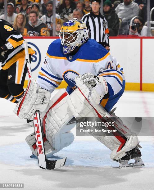 Malcolm Subban of the Buffalo Sabres defends the net against the Pittsburgh Penguins at PPG PAINTS Arena on December 17, 2021 in Pittsburgh,...