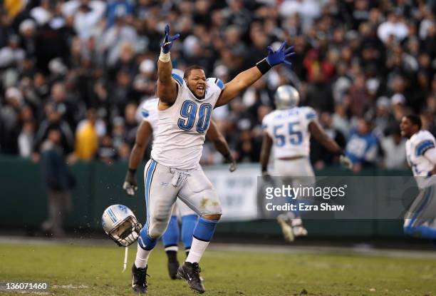 Ndamukong Suh of the Detroit Lions celebrates after they came from behind to beat the Oakland Raiders at O.co Coliseum on December 18, 2011 in...