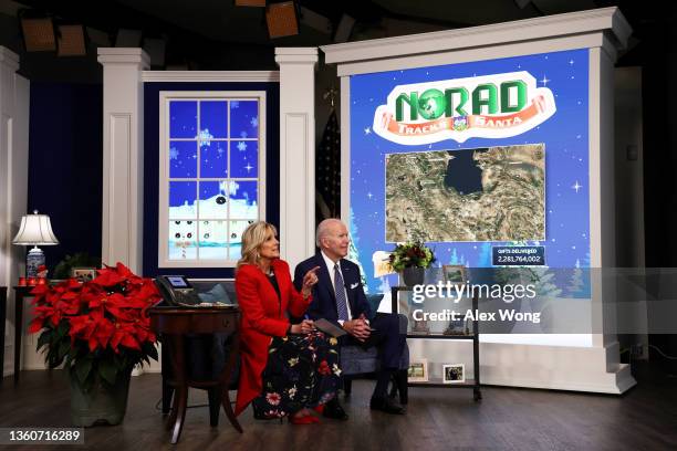 President Joe Biden and first lady Dr. Jill Biden participate in an event to call NORAD and track the path of Santa Claus on Christmas Eve in the...