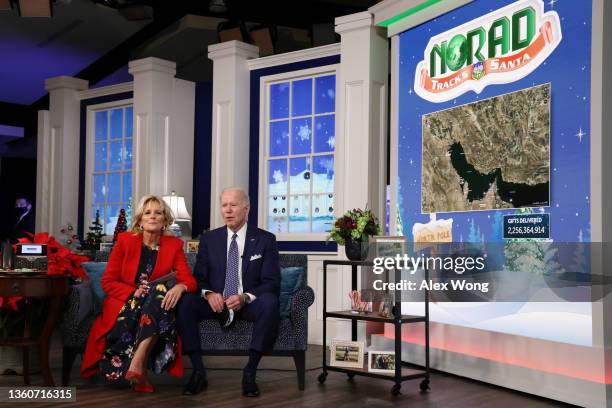 President Joe Biden and first lady Dr. Jill Biden participate in an event to call NORAD and track the path of Santa Claus on Christmas Eve in the...