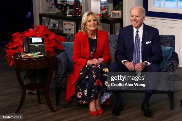 President Joe Biden and first lady Dr. Jill Biden participate in an event to call NORAD and track the path of Santa Claus on Christmas Eve in the...