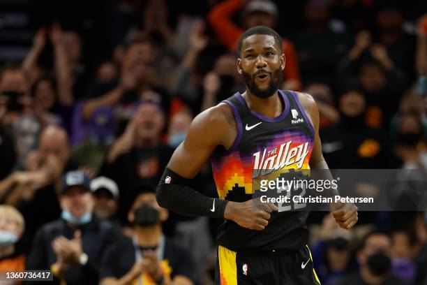 Deandre Ayton of the Phoenix Suns reacts during the second half of the NBA game at Footprint Center on December 23, 2021 in Phoenix, Arizona. The...