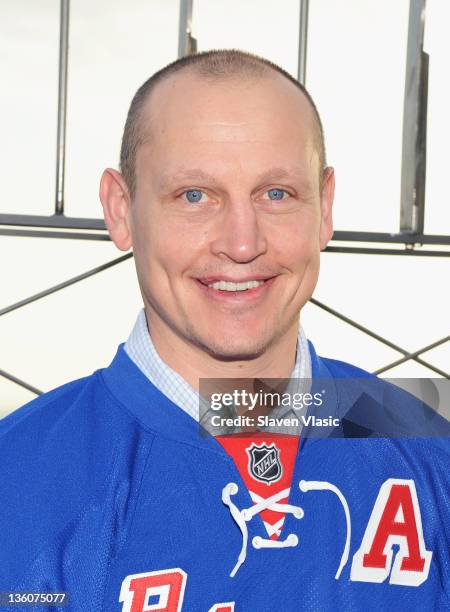 New York Rangers alumnus Adam Graves visits The Empire State Building on December 22, 2011 in New York City.