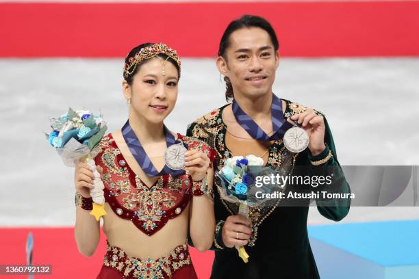 Kana Muramoto and Daisuke Takahashi of Japan pose with madals during day three of the 90th All Japan Figure Skating Championships at Saitama Super...