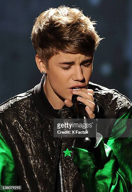 Singer Justin Bieber performs onstage at FOX's 'The X Factor' Live Finale Show on December 22, 2011 in Hollywood, California. THE X FACTOR Finale...