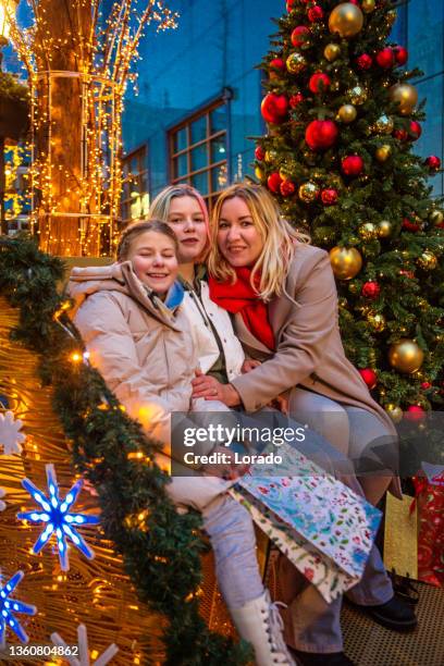 a beautiful dutch family at winter xmas shopping in holland - offspring culture tourism festival stock pictures, royalty-free photos & images