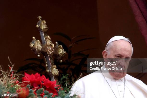 Pope Francis delivers his Christmas Urbi Et Orbi blessing from the central balcony of St. Peter's Basilica at St. Peter's Square on December 25, 2021...