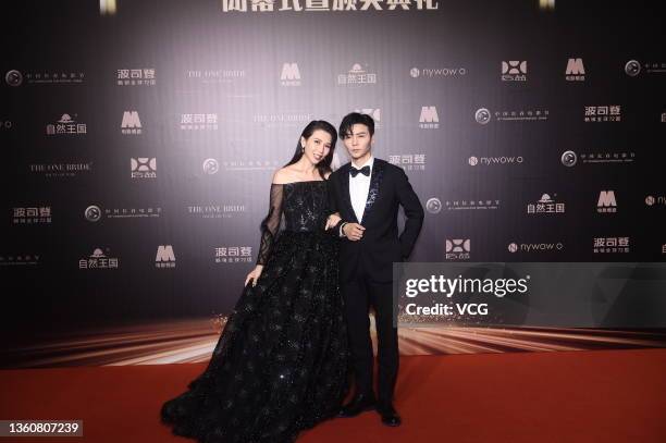 Actress Ada Choi Siu-fan and her husband Max Zhang Jin attend the closing ceremony of 16th Changchun Film Festival on December 25, 2021 in Changchun,...