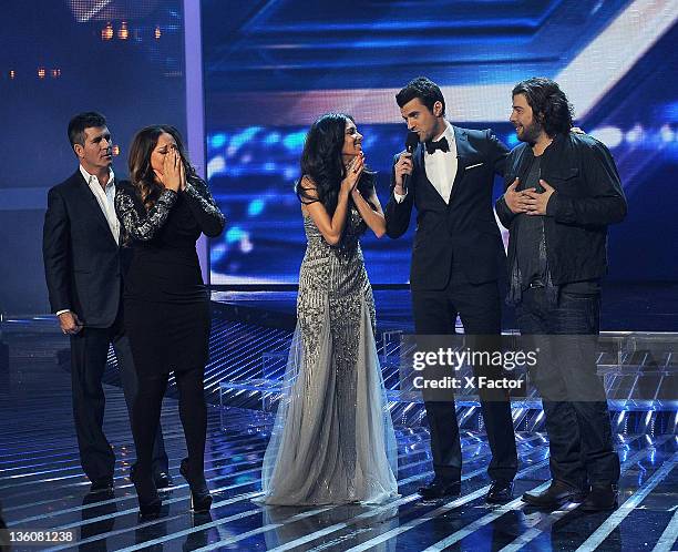 Judge Simon Cowell, winning contestant Melanie Amaro, judge Nicole Scherzinger, host Steve Jones and finalist Josh Krajcik onstage at FOX's 'The X...