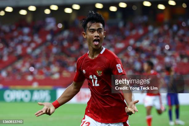 Pratama Arhan Alif Rifai of Indonesia celebrates after scoring his team's second goal against Singapore in the second half during the second leg of...