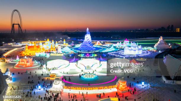 Aerial view of tourists visiting the 23rd Harbin Ice and Snow World on the opening day on December 25, 2021 in Harbin, Heilongjiang Province of China.