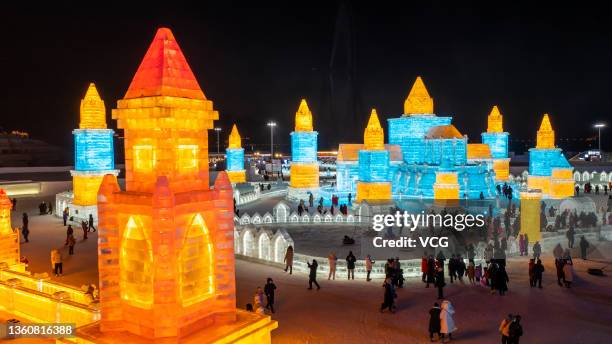 Aerial view of tourists visiting the 23rd Harbin Ice and Snow World on the opening day on December 25, 2021 in Harbin, Heilongjiang Province of China.