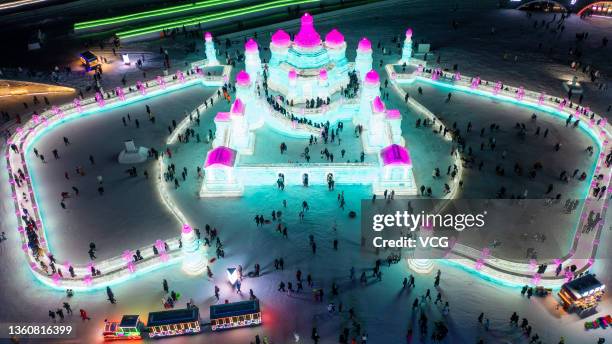 Aerial view of tourists visiting the 23rd Harbin Ice and Snow World on the opening day on December 25, 2021 in Harbin, Heilongjiang Province of China.