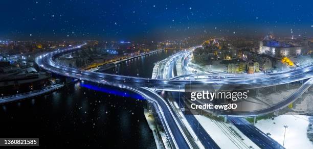szczecin city highway by night in winter, poland - stettin stockfoto's en -beelden