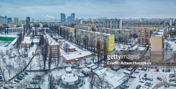 winter cityscape of panoramic view on residential soviet area - kyiv stock-fotos und bilder