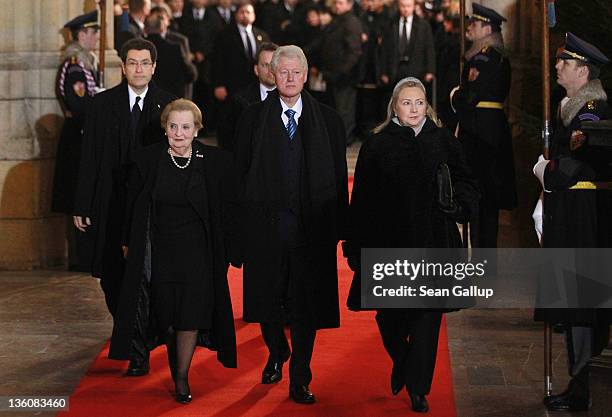 Former U.S. Secretary of State Madelaine Albright, former U.S. President Bill Clinton and current U.S. Secretary of State Hillary Clinton arrive for...