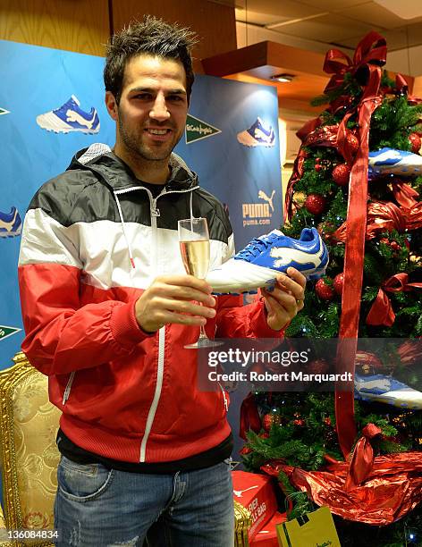 Cesc Fabregas attends a press presentation of the new Puma PowerCat 1.12 shoe at the Corte Ingles store on December 23, 2011 in Barcelona, Spain.