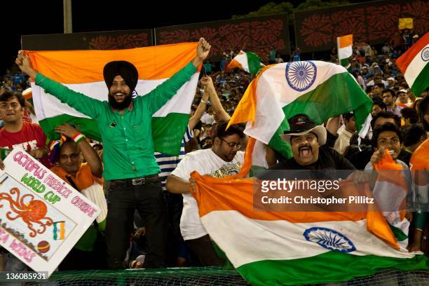 Indian fans celebrate at the Cricket World Cup semi-final match against Pakistan at the Punjab Cricket Association Stadium , Mohali, India, 30th...
