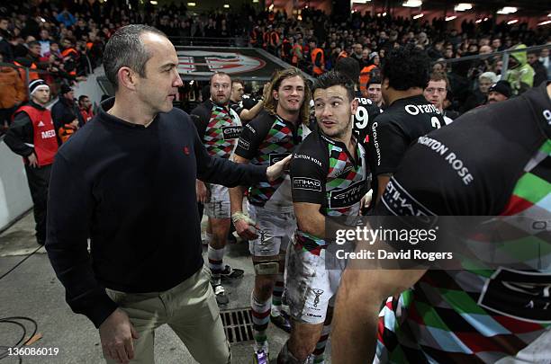 Conor O'Shea, the Harlequins director of rugby, congratulates Danny Care after their victory during the Heineken Cup match between Toulouse and...