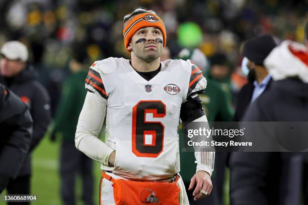 Baker Mayfield of the Cleveland Browns walks off the field after losing to the Green Bay Packers 24-22 at Lambeau Field on December 25, 2021 in Green...