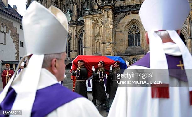 Soldiers carry the coffin from the Cathedral at the funeral service for former Czech president Vaclav Havel in Prague, December 23, 2011. Havel, a...