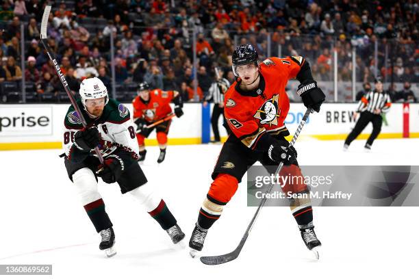 Troy Terry of the Anaheim Ducks skates past Anton Stralman of the Arizona Coyotes during the third period of a game at Honda Center on December 17,...