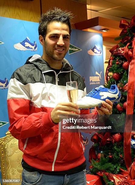 Cesc Fabregas attends a press presentation of the new Puma PowerCat 1.12 shoe at the Corte Ingles store on December 23, 2011 in Barcelona, Spain.