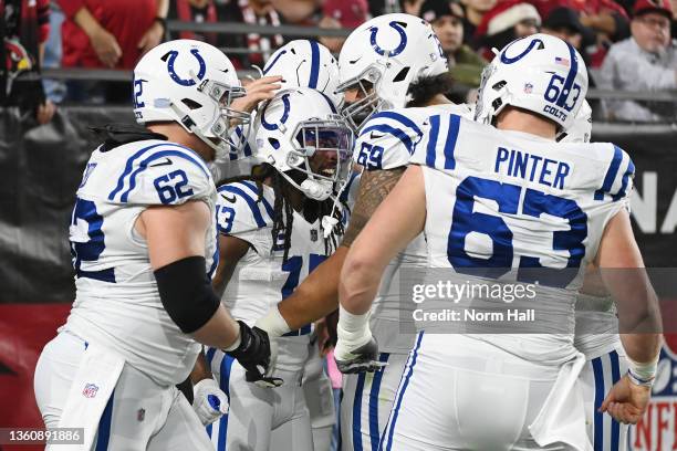 Hilton of the Indianapolis Colts celebrates with teammates after scoring a touchdown on a one-yard touchdown pass from Carson Wentz against the...