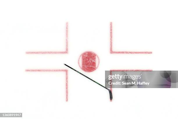 Stick lays in the faceoff circle during the second period of a game between the Anaheim Ducks and the Seattle Kraken at Honda Center on December 15,...