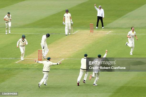 Pat Cummins of Australia celebrates after dismissing Haseeb Hameed of England during day one of the Third Test match in the Ashes series between...