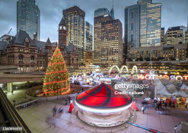 it's toronto christmas time (downtown life) - toronto winter stock pictures, royalty-free photos & images